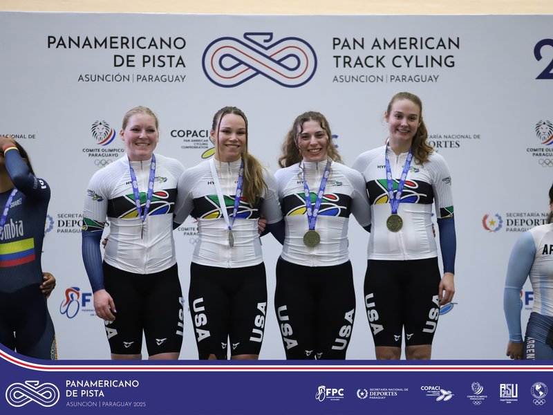 US sprint team at the Panam games, with their gold medals, in champion jerseys